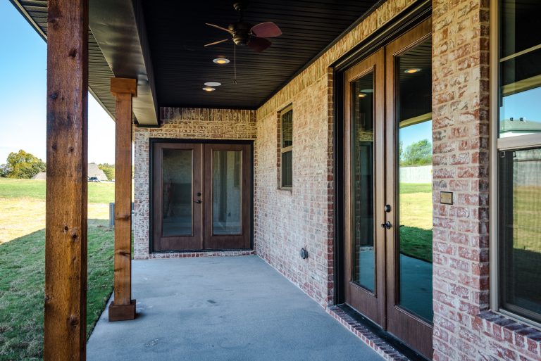 Master bedroom access from private patio. Photo Credit: Mallory Jeffers Photography
