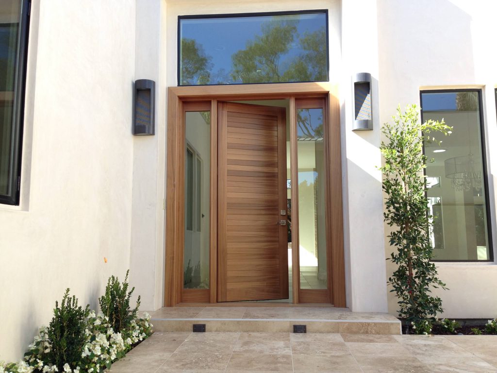 • Matching Garage door, Entry gate and Entry Door • Contemporary Tropical design • Ribbon Sapele wood • Custom stain with Dead Flat Clear coat • True Mortise and Tenon construction Chase Ford by Tungsten Royce Custom Wood Products | Outdoor Photos | Porch | Landscaping | Landscape Design | Outdoor Living Space | Porch Design Ideas | Outdoor Living Space Ideas | Backyard Design