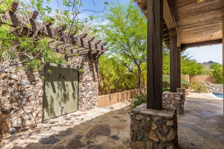 Mediteranean Style Home with Private courtyard having built in BBQ and fireplace.