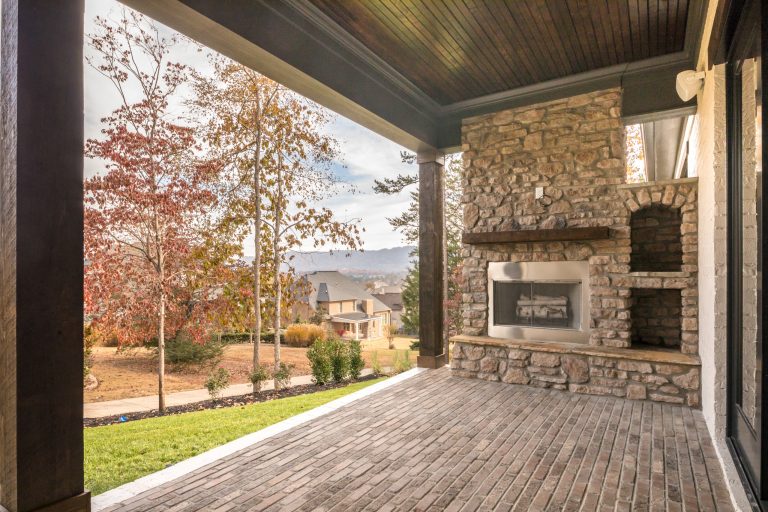 Mid-sized 1960s brick back porch idea in Other with a fire pit and a roof extension by New Image Construction | Outdoor Photos | Porch | Landscaping | Landscape Design | Outdoor Living Space | Porch Design Ideas | Outdoor Living Space Ideas | Backyard Design