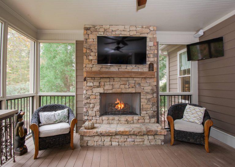 Mid-sized arts and crafts back porch idea in Atlanta with a fireplace, decking and a roof extension by J Manifold Construction | Outdoor Photos | Porch | Landscaping | Landscape Design | Outdoor Living Space | Porch Design Ideas | Outdoor Living Space Ideas | Backyard Design