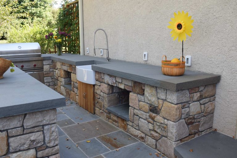 Mid-sized arts and crafts backyard concrete paver patio kitchen photo in Philadelphia with no cover