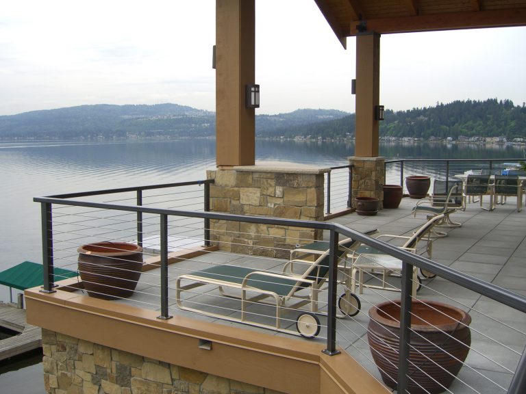 Mid-sized arts and crafts backyard deck photo in Portland with no cover