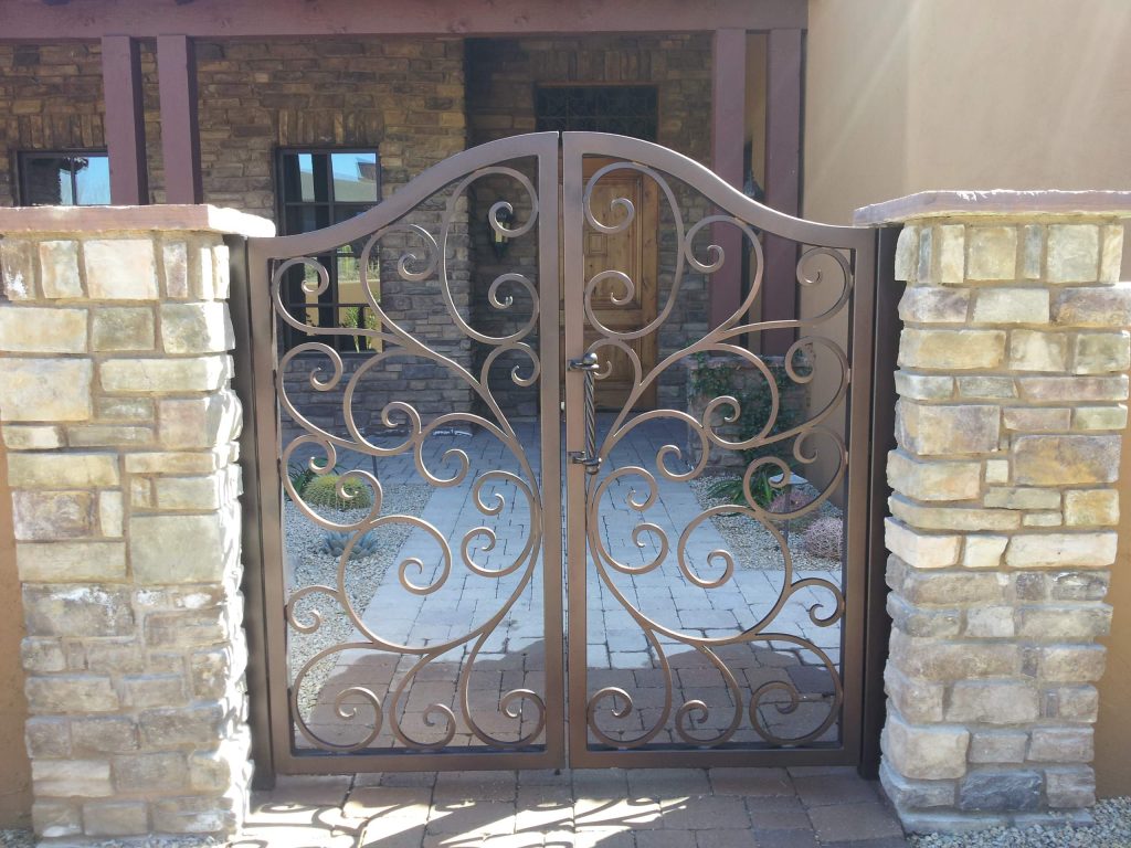 Mid-sized arts and crafts brick front porch idea in Phoenix with a roof extension by Victory Metal Works | Outdoor Photos | Porch | Landscaping | Landscape Design | Outdoor Living Space | Porch Design Ideas | Outdoor Living Space Ideas | Backyard Design