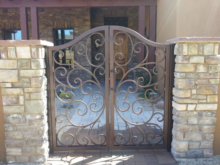 Mid-sized arts and crafts brick front porch idea in Phoenix with a roof extension by Victory Metal Works | Outdoor Photos | Porch | Landscaping | Landscape Design | Outdoor Living Space | Porch Design Ideas | Outdoor Living Space Ideas | Backyard Design