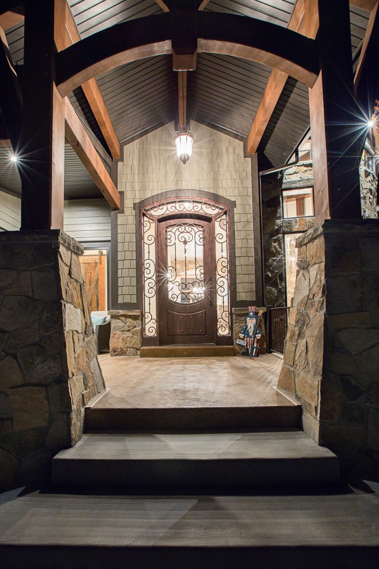 Mid-sized arts and crafts concrete front porch idea in Salt Lake City with a roof extension by Raykon Construction | Outdoor Photos | Porch | Landscaping | Landscape Design | Outdoor Living Space | Porch Design Ideas | Outdoor Living Space Ideas | Backyard Design