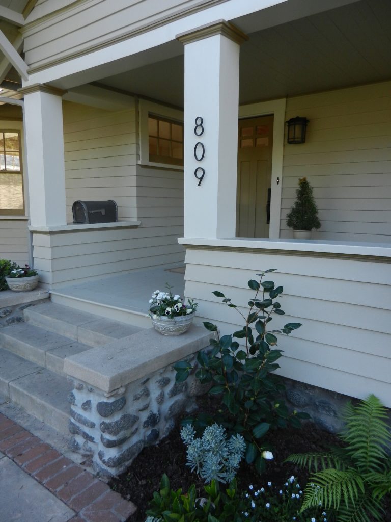 Mid-sized arts and crafts concrete porch idea in Los Angeles with a roof extension by LN Properties, LLC | Outdoor Photos | Porch | Landscaping | Landscape Design | Outdoor Living Space | Porch Design Ideas | Outdoor Living Space Ideas | Backyard Design