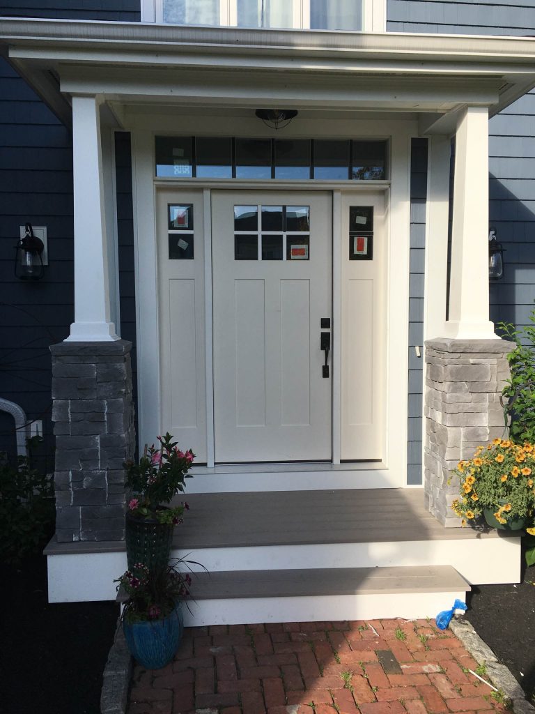 Mid-sized arts and crafts front porch idea in Boston with decking and an awning by Dream Home Improvement LLC | Outdoor Photos | Porch | Landscaping | Landscape Design | Outdoor Living Space | Porch Design Ideas | Outdoor Living Space Ideas | Backyard Design