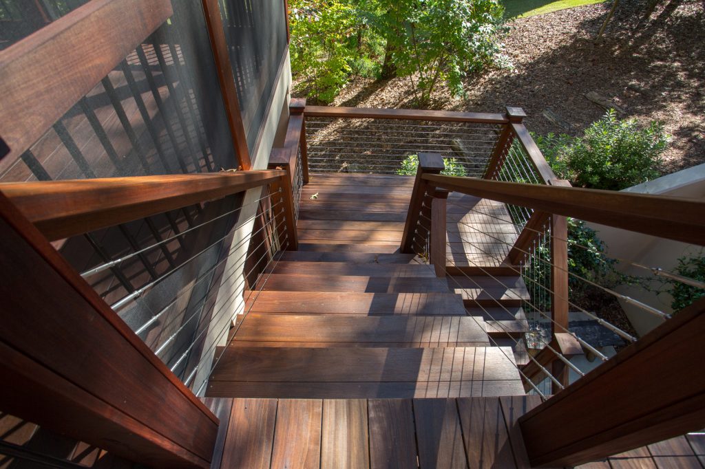 Mid-sized arts and crafts screened-in back porch idea with decking and a roof extension by Alair Homes Clemson | Outdoor Photos | Porch | Landscaping | Landscape Design | Outdoor Living Space | Porch Design Ideas | Outdoor Living Space Ideas | Backyard Design