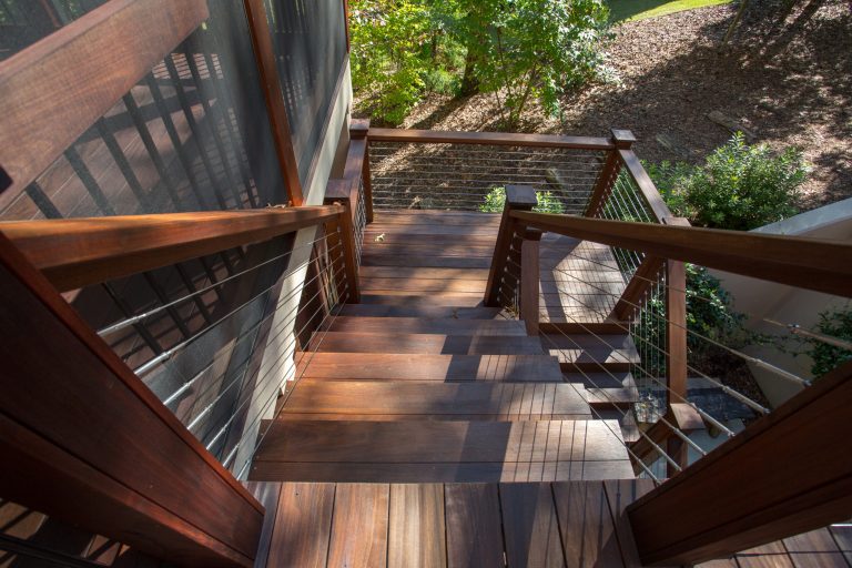 Mid-sized arts and crafts screened-in back porch idea with decking and a roof extension by Alair Homes Clemson | Outdoor Photos | Porch | Landscaping | Landscape Design | Outdoor Living Space | Porch Design Ideas | Outdoor Living Space Ideas | Backyard Design