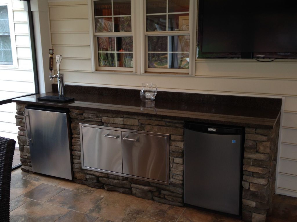 Mid-sized arts and crafts screened-in back porch photo in Charlotte with a roof extension by Premier Building and Renovations | Outdoor Photos | Porch | Landscaping | Landscape Design | Outdoor Living Space | Porch Design Ideas | Outdoor Living Space Ideas | Backyard Design