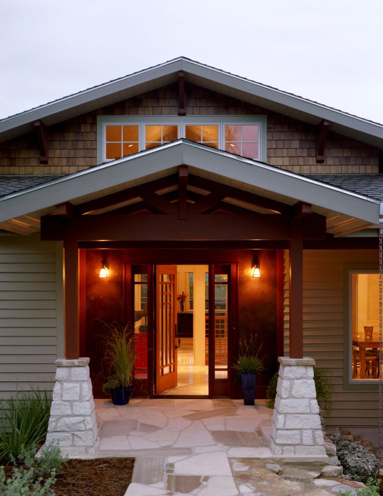 Mid-sized arts and crafts stone front porch photo in Austin with an awning by Craftsman Homes of Austin | Outdoor Photos | Porch | Landscaping | Landscape Design | Outdoor Living Space | Porch Design Ideas | Outdoor Living Space Ideas | Backyard Design