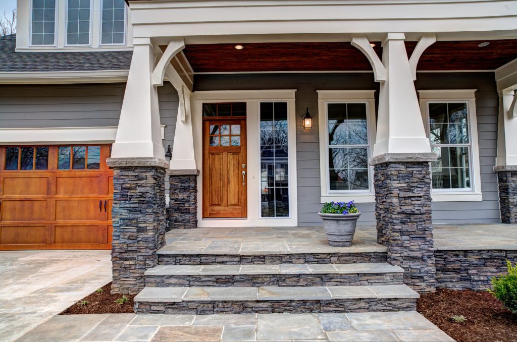 Mid-sized arts and crafts stone porch idea in DC Metro with a roof extension by Mains Signature Homes Inc. | Outdoor Photos | Porch | Landscaping | Landscape Design | Outdoor Living Space | Porch Design Ideas | Outdoor Living Space Ideas | Backyard Design