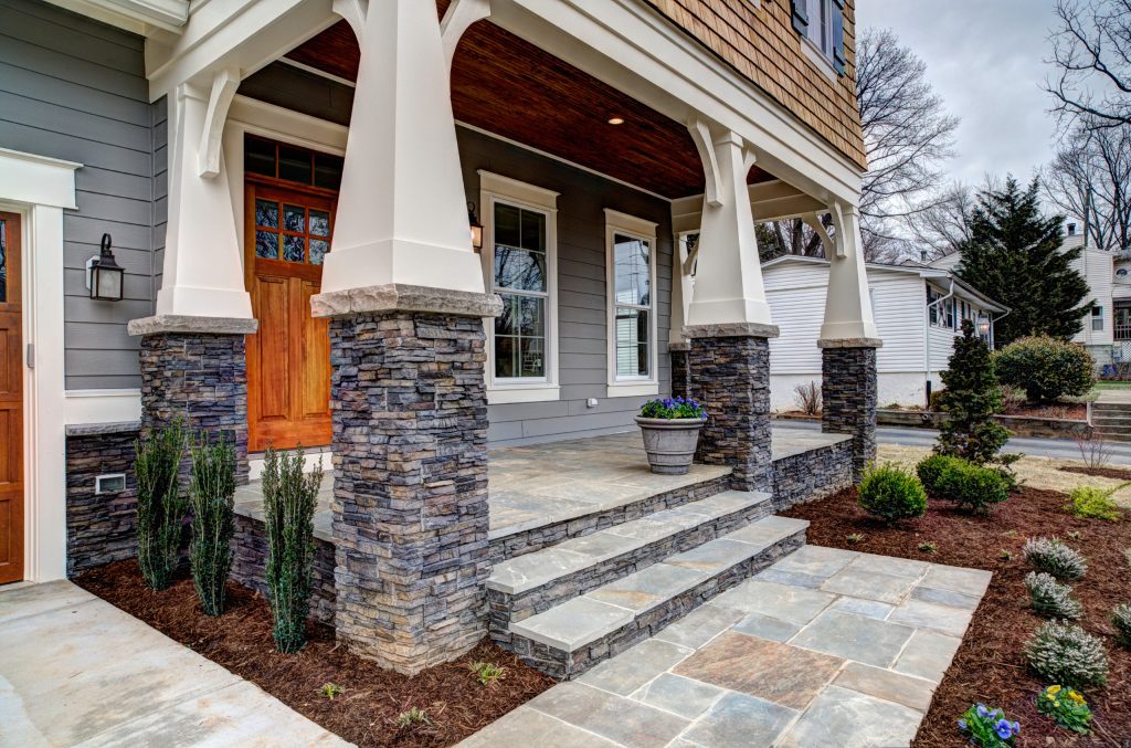 Mid-sized arts and crafts stone porch photo in DC Metro with a roof extension by Mains Signature Homes Inc. | Outdoor Photos | Porch | Landscaping | Landscape Design | Outdoor Living Space | Porch Design Ideas | Outdoor Living Space Ideas | Backyard Design
