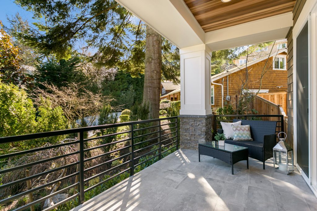 Mid-sized arts and crafts tile front porch idea in Seattle with a roof extension by JayMarc Homes | Outdoor Photos | Porch | Landscaping | Landscape Design | Outdoor Living Space | Porch Design Ideas | Outdoor Living Space Ideas | Backyard Design