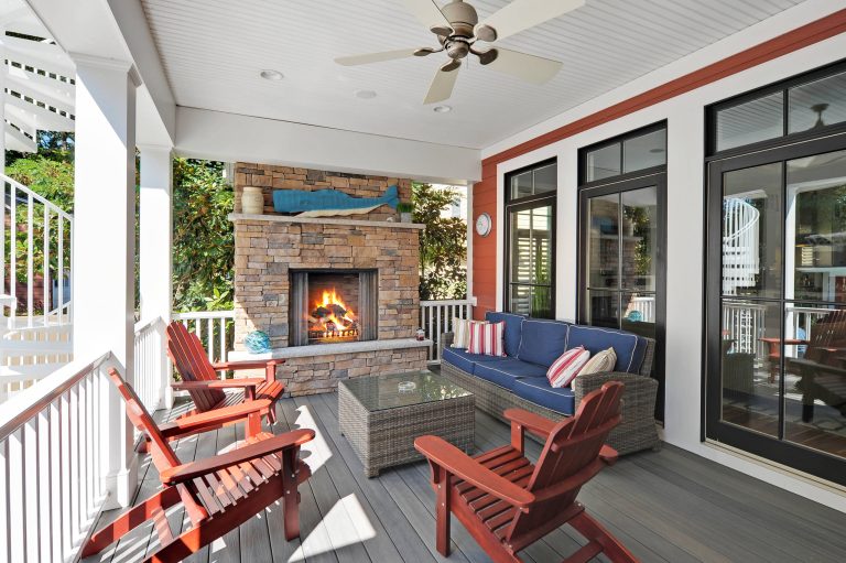 Mid-sized beach style back porch idea in Philadelphia with a fire pit, decking and a roof extension by Echelon Custom Homes | Outdoor Photos | Porch | Landscaping | Landscape Design | Outdoor Living Space | Porch Design Ideas | Outdoor Living Space Ideas | Backyard Design