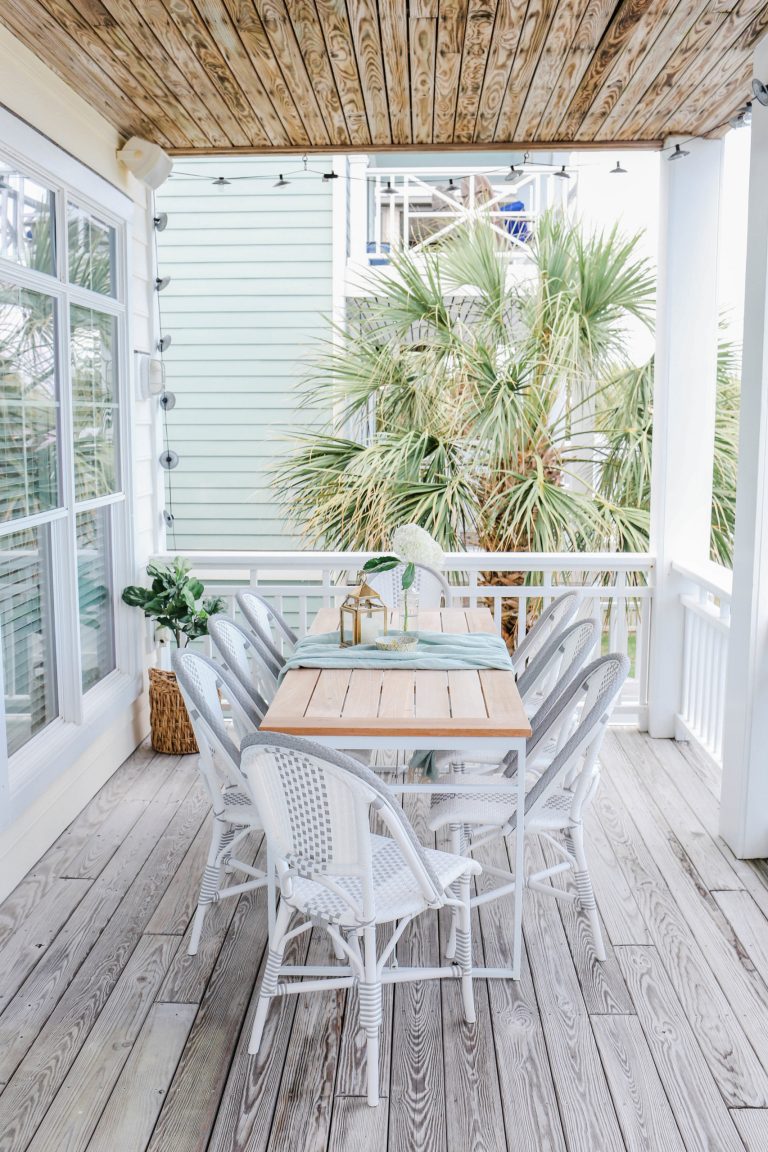 Mid-sized beach style back porch photo in Other with decking and a roof extension by Mary Hannah Interiors | Outdoor Photos | Porch | Landscaping | Landscape Design | Outdoor Living Space | Porch Design Ideas | Outdoor Living Space Ideas | Backyard Design