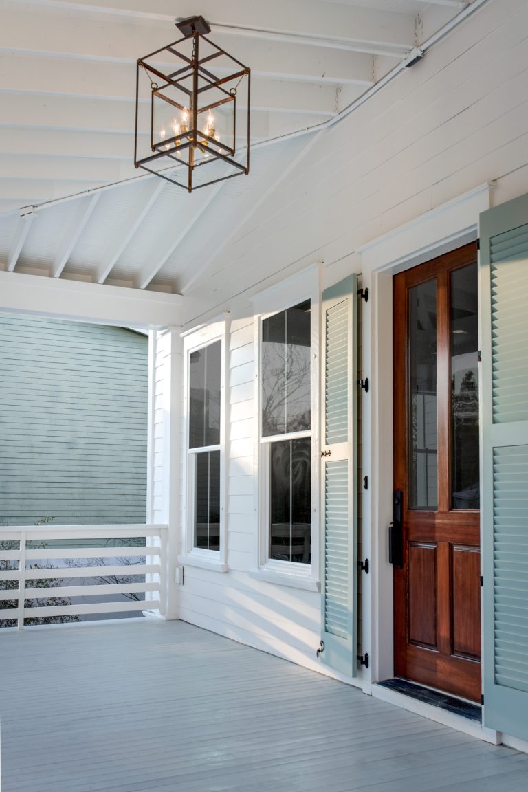 Mid-sized beach style front porch photo in Charleston with decking and a roof extension by Barrow Building Group | Outdoor Photos | Porch | Landscaping | Landscape Design | Outdoor Living Space | Porch Design Ideas | Outdoor Living Space Ideas | Backyard Design