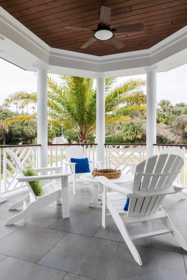 Mid-sized beach style tile back porch idea in Jacksonville with a roof extension by Heritage Homes of Jacksonville | Outdoor Photos | Porch | Landscaping | Landscape Design | Outdoor Living Space | Porch Design Ideas | Outdoor Living Space Ideas | Backyard Design