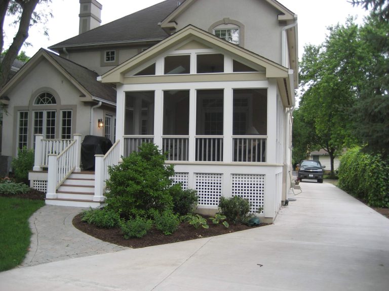 Mid-sized classic brick screened-in back porch idea in Chicago with a roof extension by A Street Builders, Inc. | Outdoor Photos | Porch | Landscaping | Landscape Design | Outdoor Living Space | Porch Design Ideas | Outdoor Living Space Ideas | Backyard Design