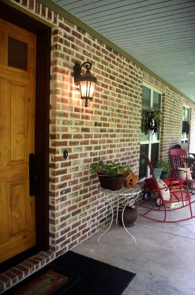 Mid-sized classic concrete front porch idea in Houston with a roof extension by Pelco Builders | Outdoor Photos | Porch | Landscaping | Landscape Design | Outdoor Living Space | Porch Design Ideas | Outdoor Living Space Ideas | Backyard Design