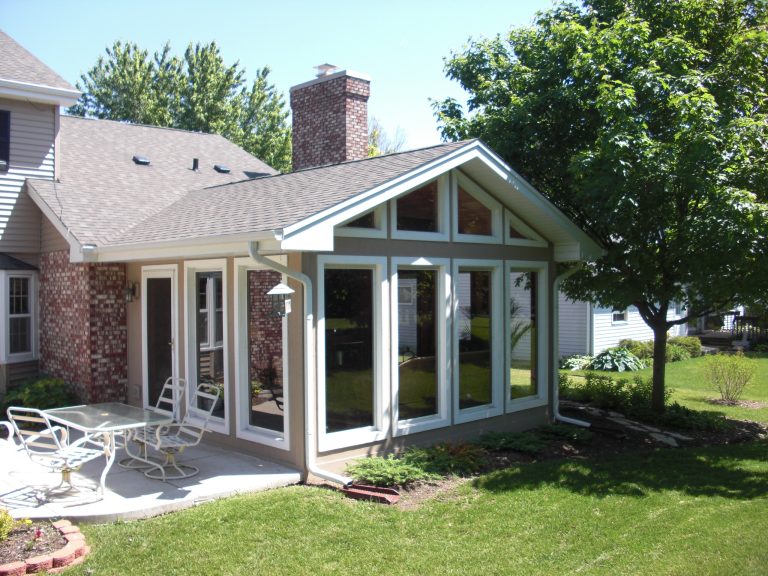 Mid-sized classic concrete porch idea in Chicago with a roof extension by Apex Builders, Inc. | Outdoor Photos | Porch | Landscaping | Landscape Design | Outdoor Living Space | Porch Design Ideas | Outdoor Living Space Ideas | Backyard Design