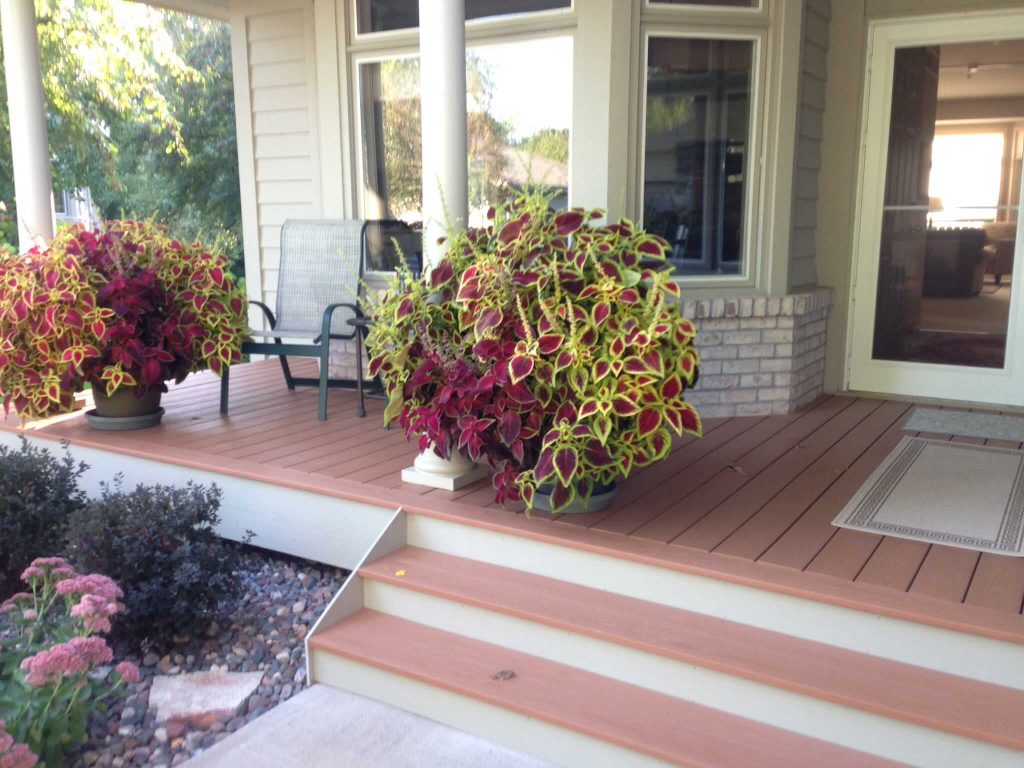 Mid-sized classic front porch idea in Minneapolis with decking by Arbor Haus | Outdoor Photos | Porch | Landscaping | Landscape Design | Outdoor Living Space | Porch Design Ideas | Outdoor Living Space Ideas | Backyard Design