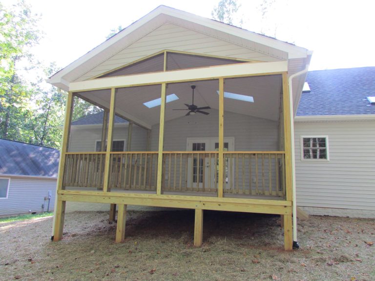 Mid-sized classic screened-in back porch idea in Other with decking and a roof extension by SHADE & SHUTTER EXPO | Outdoor Photos | Porch | Landscaping | Landscape Design | Outdoor Living Space | Porch Design Ideas | Outdoor Living Space Ideas | Backyard Design