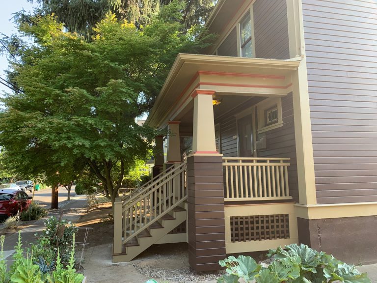 Mid-sized classic wood railing front porch idea in Portland with a roof extension by Porch Masters | Outdoor Photos | Porch | Landscaping | Landscape Design | Outdoor Living Space | Porch Design Ideas | Outdoor Living Space Ideas | Backyard Design