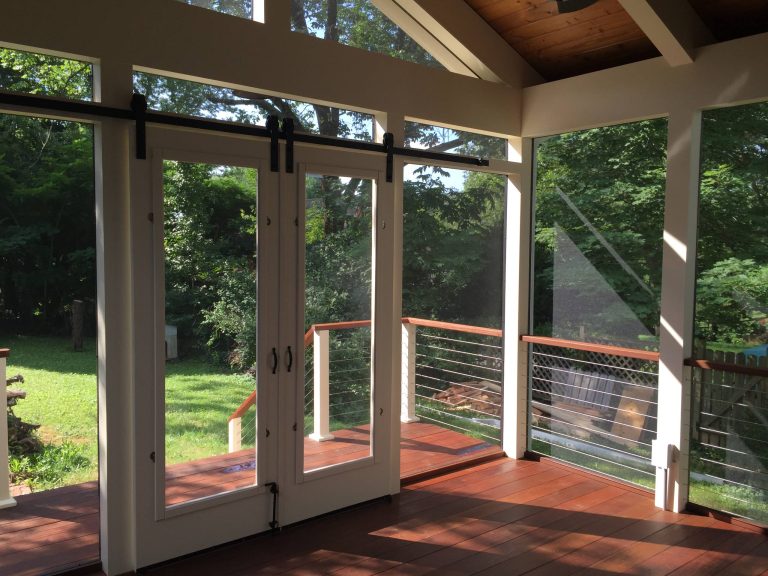 Mid-sized cottage screened-in back porch idea in Other with decking and a roof extension by Integrity Design + Build | Outdoor Photos | Porch | Landscaping | Landscape Design | Outdoor Living Space | Porch Design Ideas | Outdoor Living Space Ideas | Backyard Design