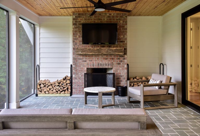 Mid-sized cottage stone back porch idea in Other with a fireplace and a roof extension by Jonathan Miller Architects | Outdoor Photos | Porch | Landscaping | Landscape Design | Outdoor Living Space | Porch Design Ideas | Outdoor Living Space Ideas | Backyard Design