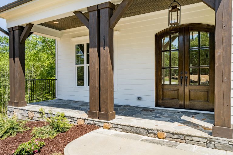 Mid-sized country front porch photo in Raleigh by Poythress Construction Company Inc. | Outdoor Photos | Porch | Landscaping | Landscape Design | Outdoor Living Space | Porch Design Ideas | Outdoor Living Space Ideas | Backyard Design