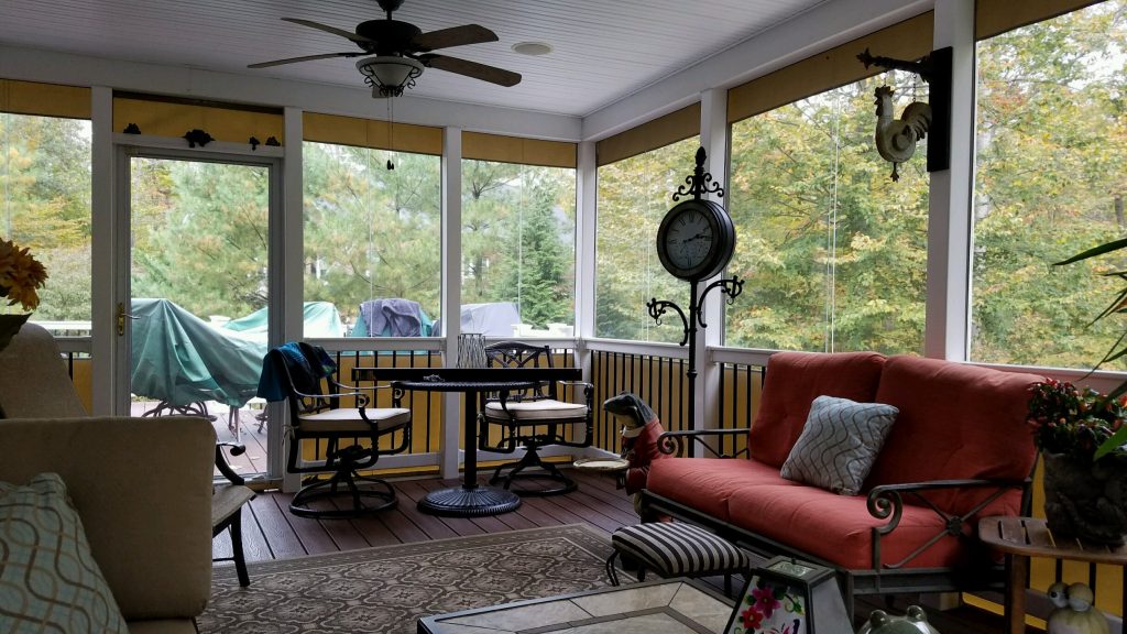 Mid-sized country screened-in back porch idea in Baltimore with decking and a roof extension by Porch Enclosure Systems | Outdoor Photos | Porch | Landscaping | Landscape Design | Outdoor Living Space | Porch Design Ideas | Outdoor Living Space Ideas | Backyard Design