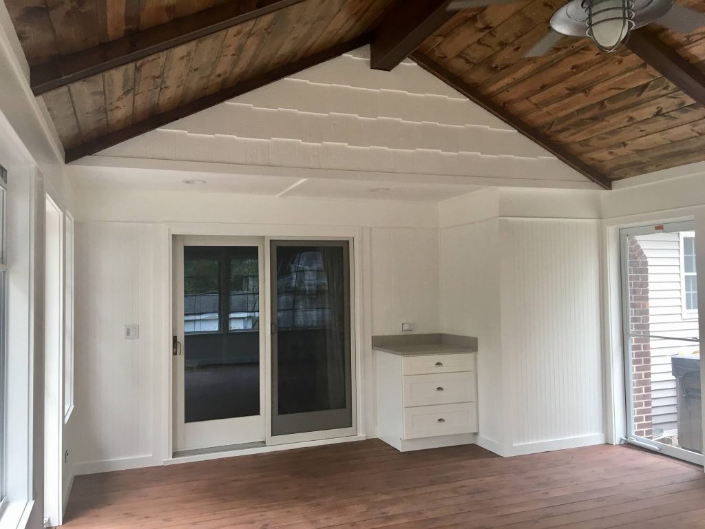 Mid-sized country screened-in back porch photo in Chicago with decking and a roof extension by Fischer Homes, Ltd. | Outdoor Photos | Porch | Landscaping | Landscape Design | Outdoor Living Space | Porch Design Ideas | Outdoor Living Space Ideas | Backyard Design