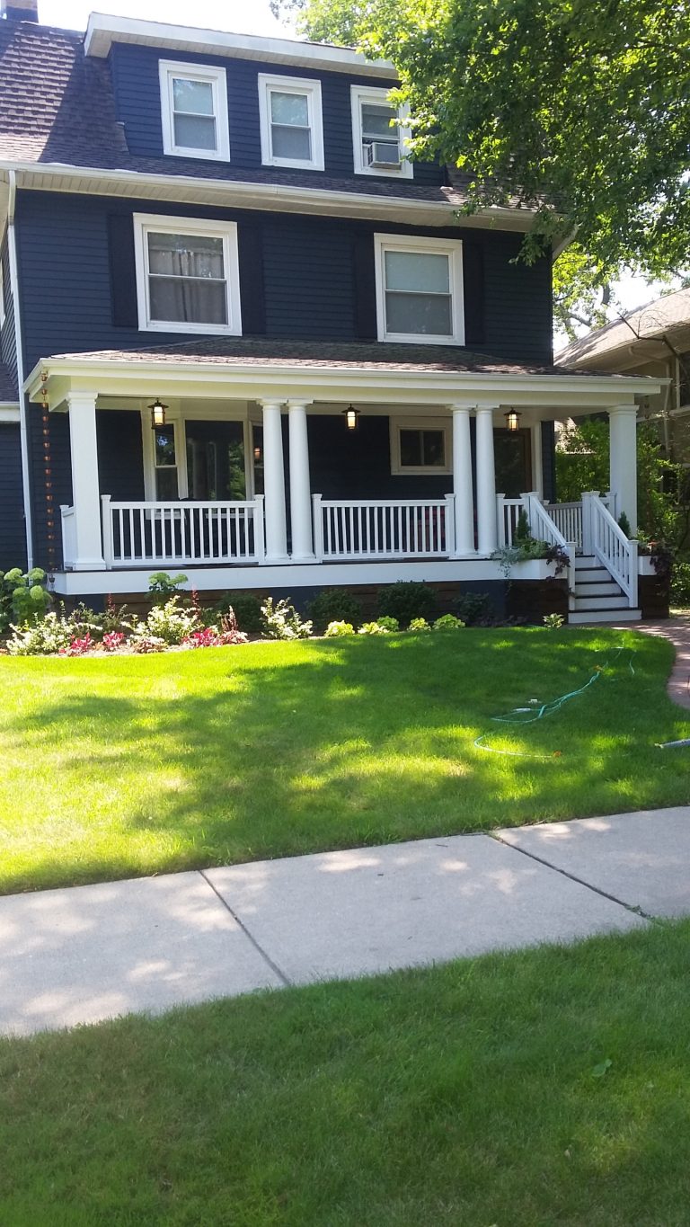 Mid-sized elegant concrete paver front porch photo in Chicago with a roof extension by Blackwater Valley Development, Inc. | Outdoor Photos | Porch | Landscaping | Landscape Design | Outdoor Living Space | Porch Design Ideas | Outdoor Living Space Ideas | Backyard Design