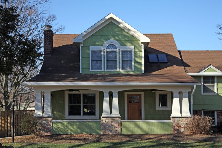 Mid-sized elegant front porch photo in DC Metro with decking and a roof extension by Commonwealth Home Design | Outdoor Photos | Porch | Landscaping | Landscape Design | Outdoor Living Space | Porch Design Ideas | Outdoor Living Space Ideas | Backyard Design