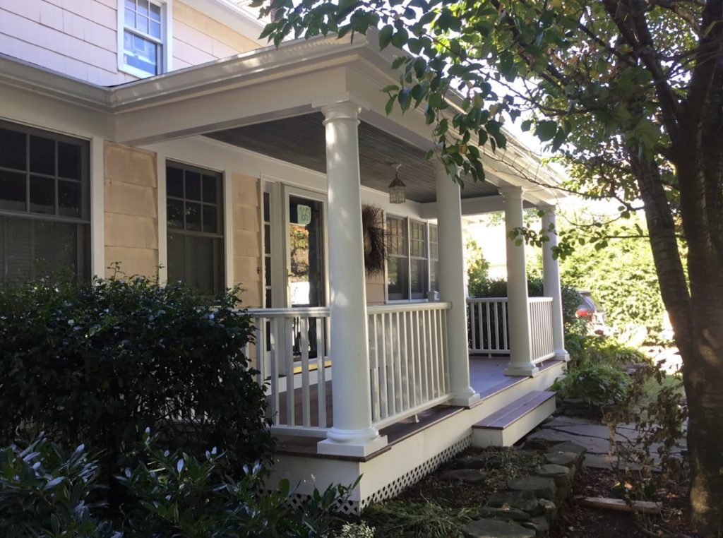 Mid-sized elegant front porch photo in New York with decking and a roof extension by Oronoque Home Improvement LLC | Outdoor Photos | Porch | Landscaping | Landscape Design | Outdoor Living Space | Porch Design Ideas | Outdoor Living Space Ideas | Backyard Design