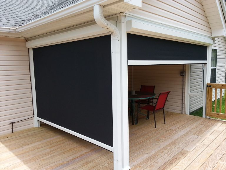 Mid-sized elegant screened-in back porch photo in Other with decking and a roof extension by Design Craft Homes Inc | Outdoor Photos | Porch | Landscaping | Landscape Design | Outdoor Living Space | Porch Design Ideas | Outdoor Living Space Ideas | Backyard Design