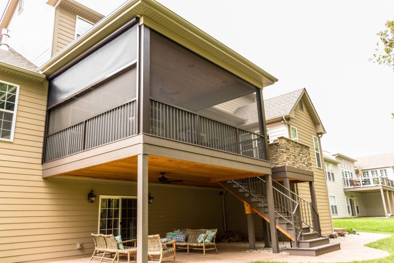Mid-sized elegant screened-in back porch photo in St Louis with a roof extension by Heartlands Building Company | Outdoor Photos | Porch | Landscaping | Landscape Design | Outdoor Living Space | Porch Design Ideas | Outdoor Living Space Ideas | Backyard Design