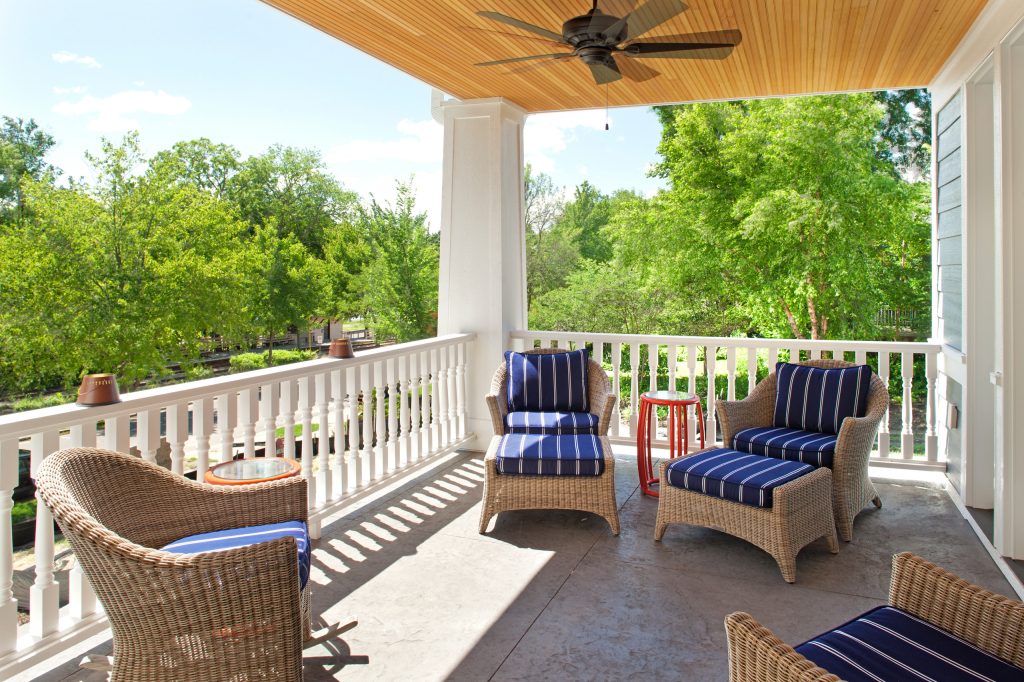 Mid-sized elegant stamped concrete front porch photo in Minneapolis with a roof extension by Ridge Creek Custom Homes | Outdoor Photos | Porch | Landscaping | Landscape Design | Outdoor Living Space | Porch Design Ideas | Outdoor Living Space Ideas | Backyard Design