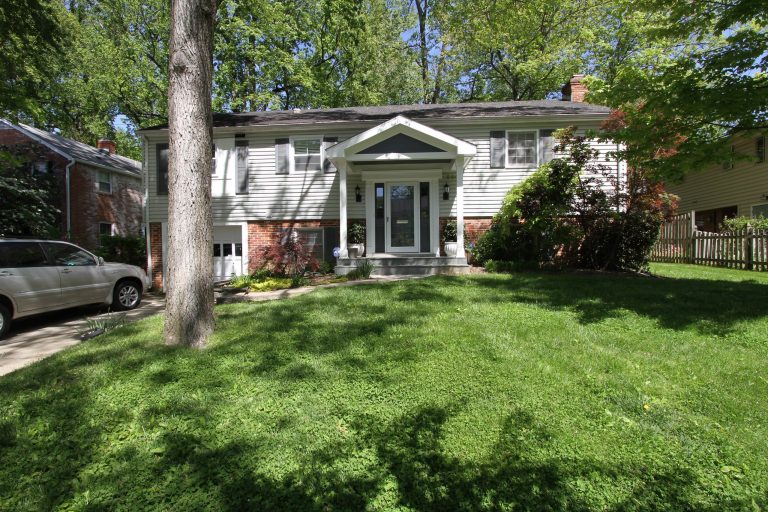 Mid-sized elegant stone front porch photo in DC Metro with a roof extension by Art and Cement Construction LLC | Outdoor Photos | Porch | Landscaping | Landscape Design | Outdoor Living Space | Porch Design Ideas | Outdoor Living Space Ideas | Backyard Design