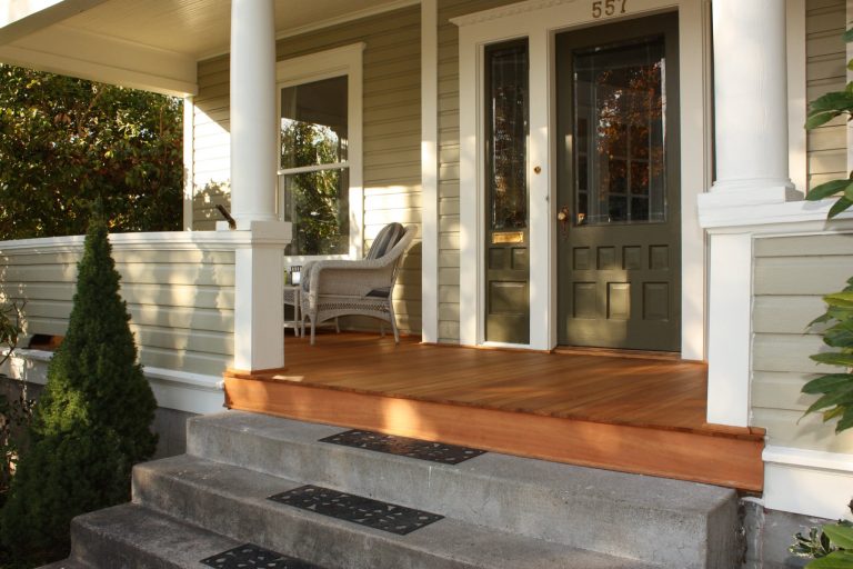 Mid-sized front porch photo in Portland with decking and a roof extension by Dave's Decks and Fencing | Outdoor Photos | Porch | Landscaping | Landscape Design | Outdoor Living Space | Porch Design Ideas | Outdoor Living Space Ideas | Backyard Design