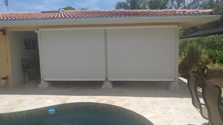 Mid-sized island style backyard tile patio kitchen photo in Tampa with a roof extension