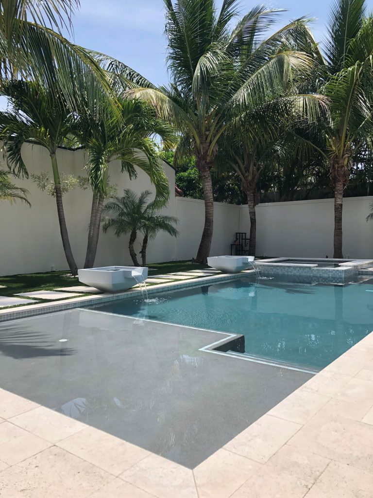 Mid-sized minimalist backyard concrete and custom-shaped natural hot tub photo