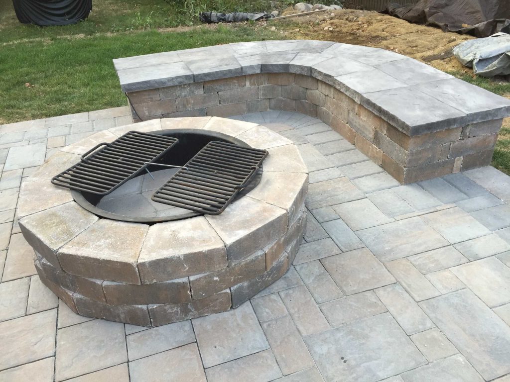 Mid-sized minimalist backyard concrete paver patio kitchen photo in New York with no cover