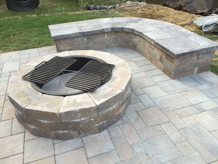 Mid-sized minimalist backyard concrete paver patio kitchen photo in New York with no cover