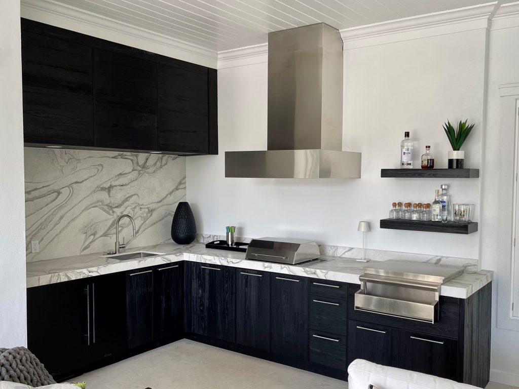 Mid-sized minimalist backyard patio kitchen photo in Miami