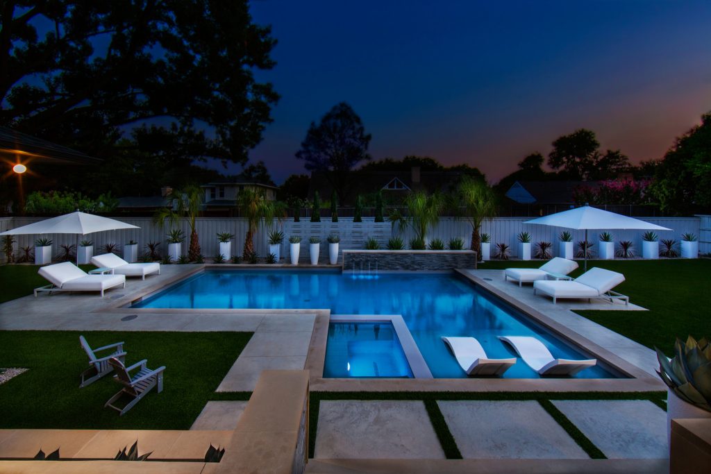 Mid-sized minimalist backyard rectangular hot tub photo in Dallas