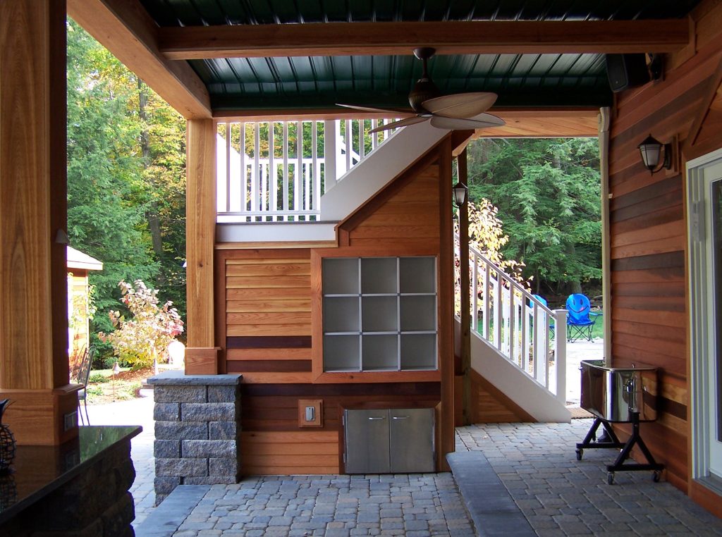 Mid-sized mountain style concrete paver back porch idea in New York with a roof extension by HAAS Landscape Architects | Outdoor Photos | Porch | Landscaping | Landscape Design | Outdoor Living Space | Porch Design Ideas | Outdoor Living Space Ideas | Backyard Design