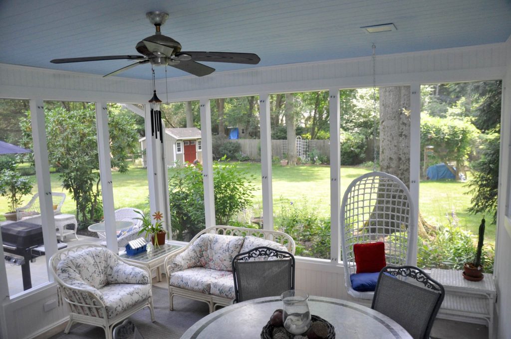 Mid-sized screened-in back porch idea in Philadelphia with a roof extension by Lawrenceville Home Improvement Center, Inc. | Outdoor Photos | Porch | Landscaping | Landscape Design | Outdoor Living Space | Porch Design Ideas | Outdoor Living Space Ideas | Backyard Design